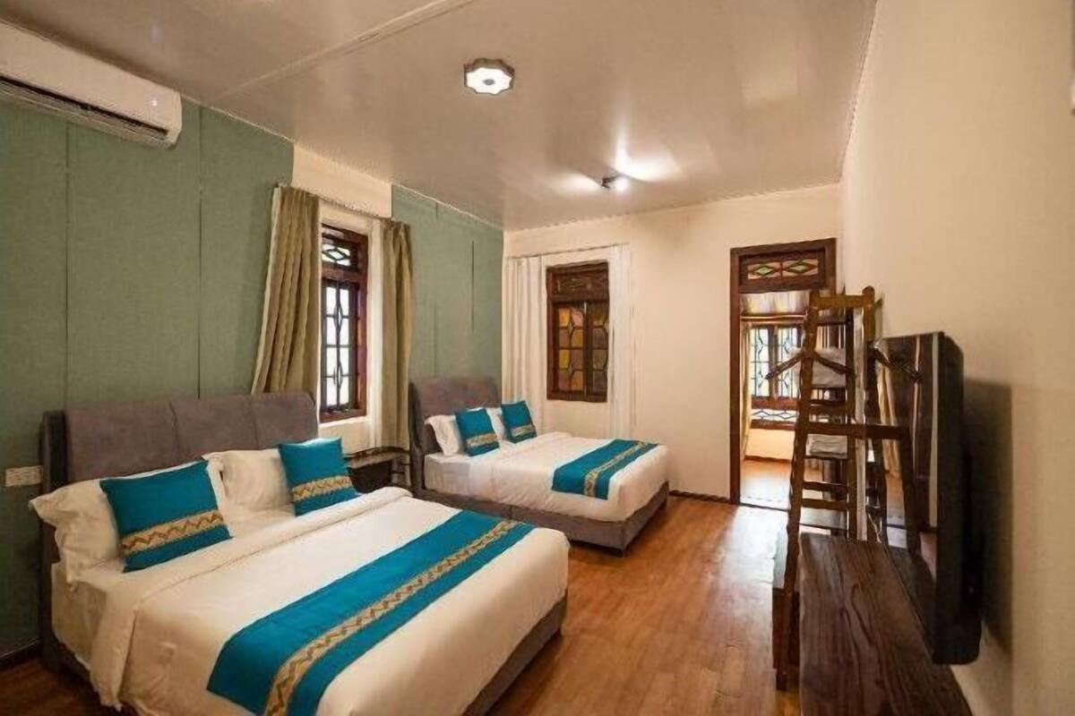 2 bedrooms, blackout drapes, soundproofing, iron/ironing board