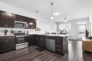 Fridge, microwave, oven, stovetop - CozySuites Modern 2BR, Nora Indianapolis #9 (Indianapolis)