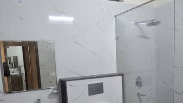 Shower, bidet, towels, soap