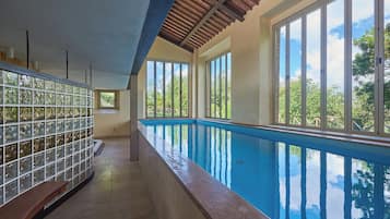 Indoor pool, seasonal outdoor pool, pool umbrellas, sun loungers