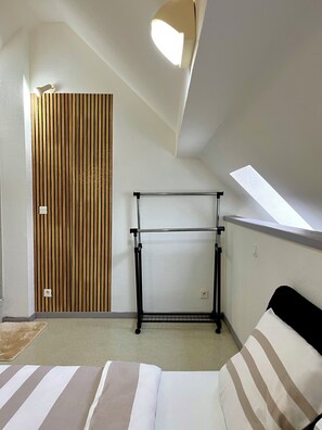 1 chambre, fer et planche à repasser, Wi-Fi gratuit, draps fournis