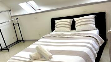 1 chambre, fer et planche Ă repasser, Wi-Fi gratuit, draps fournis