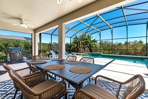 Outdoor dining - Lake View | South Facing Pool & Spa - Game Room - Emerald Island Resort - 4 miles from Disney Gate (Kissimmee)