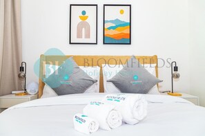 2 chambres, coffres-forts dans les chambres, fer et planche à repasser