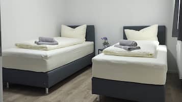 2 dormitorios, tabla de planchar con plancha, wifi y ropa de cama