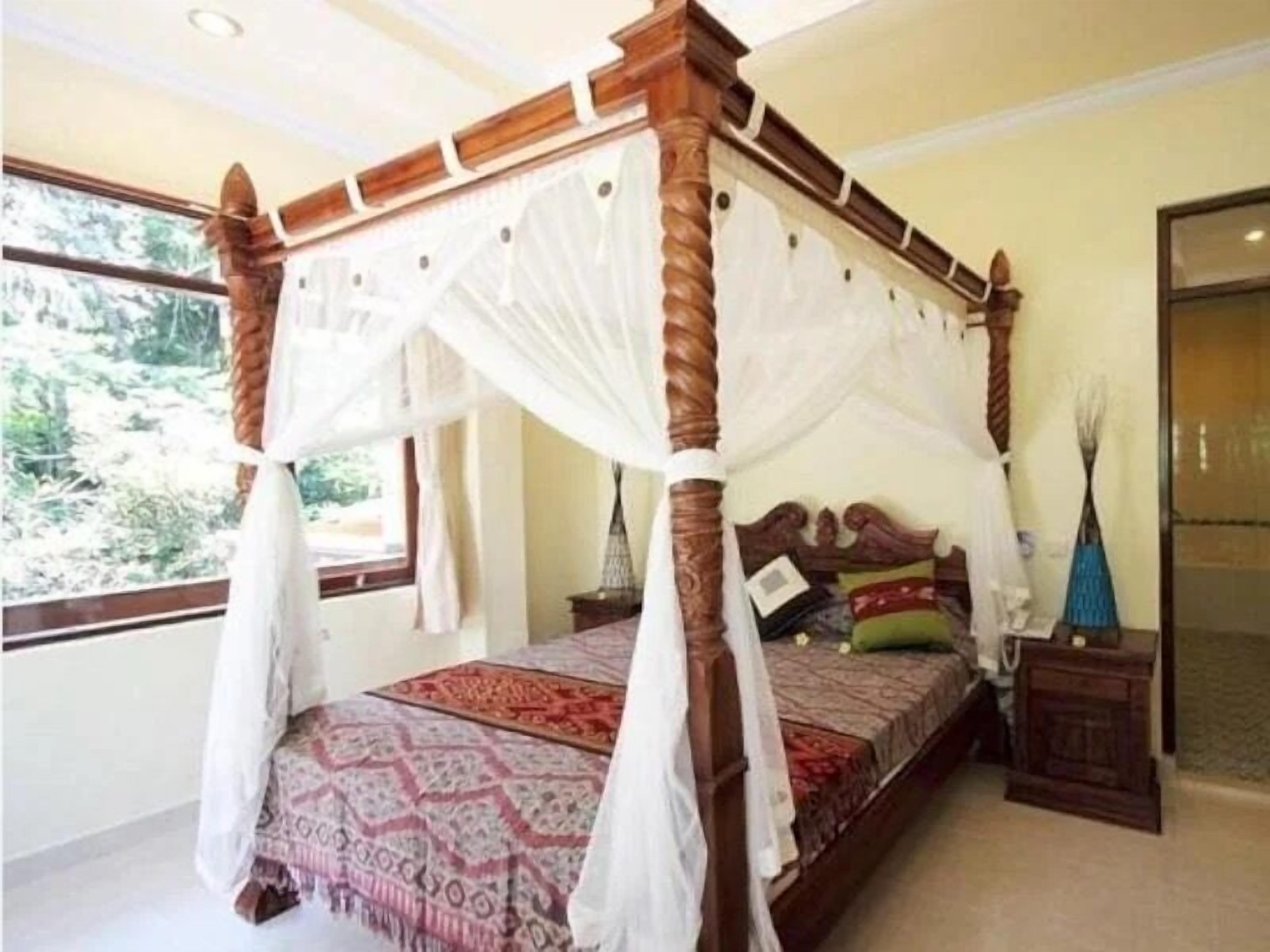 Chambre Double Deluxe, 1 grand lit, salle de bains privée, vue jardin | Bureau, espace de travail pour ordinateur portable, Wi-Fi gratuit