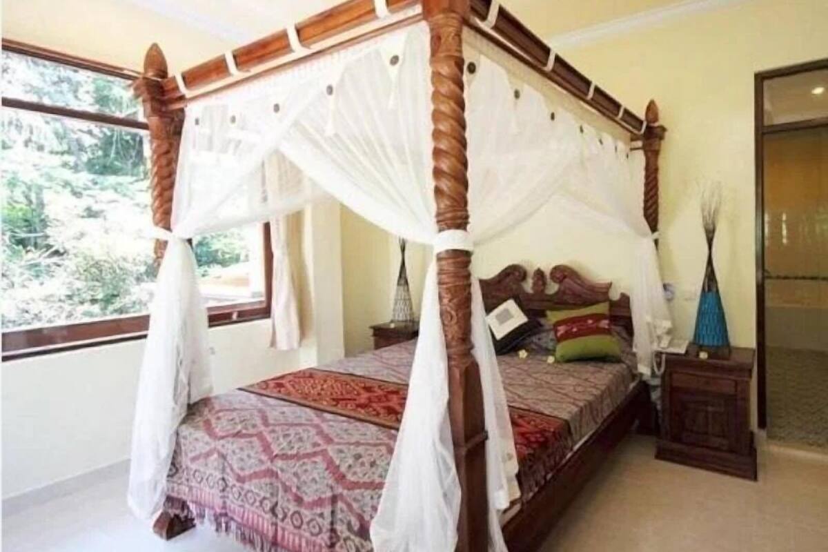 Chambre Double Deluxe, 1 grand lit, salle de bains privée, vue jardin | Bureau, espace de travail pour ordinateur portable, Wi-Fi gratuit