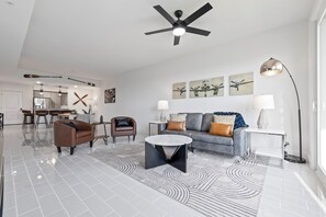 TV, offices - Luxury River Front Secluded Condo w Resort Amenities (Merritt Island)