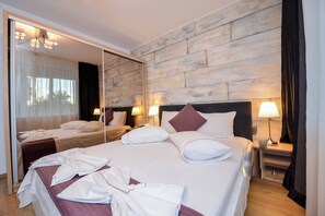 2 slaapkamers, een strijkplank/strijkijzer, internet, beddengoed