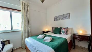 1 quarto, roupa de cama