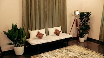 Villa, 4 Bedrooms | Living area | 55-inch Smart TV with cable channels