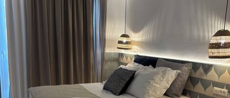 1 غرفة نوم وواي فاي وملاءات أسرّة