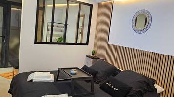 1 dormitorio, tabla de planchar con plancha, wifi gratis y ropa de cama