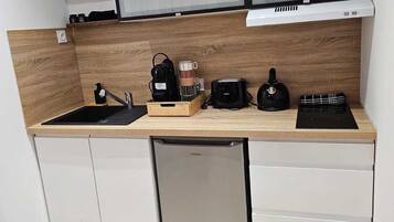Fridge, microwave, stovetop, coffee/tea maker