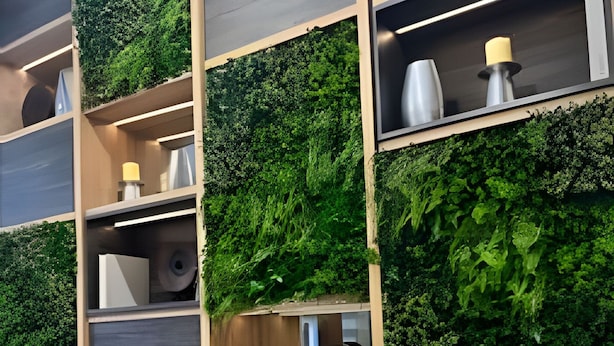 A modern interior with wooden shelves and green vertical gardens. - NR APART TOCORNAL (Santiago)