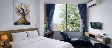 Chambre Double Deluxe | Literie de qualité supérieure, couette en duvet d'oie