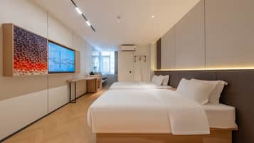 Habitación Elite con 2 camas individuales | Ropa de cama de alta calidad y edredones de plumas