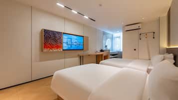 Elite Twin Room | Premium bedding, down comforters, memory foam beds, desk