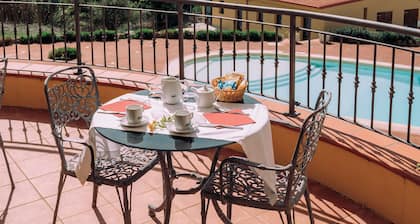 Hotel with swimming pool in Arbus