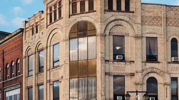 A historic building with a coffee shop on the ground floor.