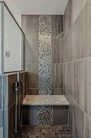 Shower, hair dryer, towels, shampoo