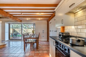 Fridge, microwave, oven, cookware/dishes/utensils