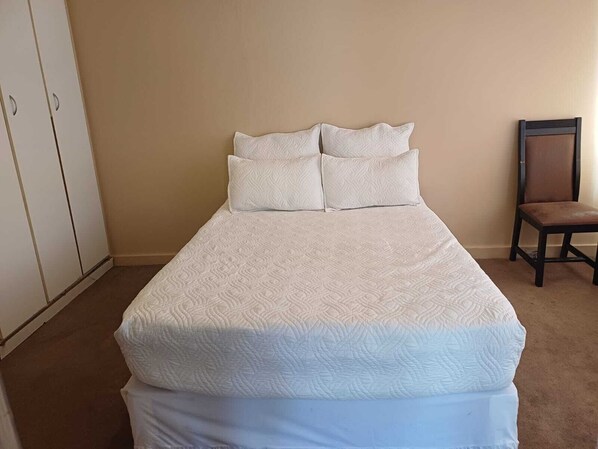 1 bedroom, desk, iron/ironing board, travel cot