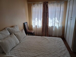 1 bedroom, desk, iron/ironing board, travel cot