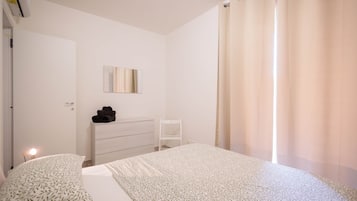 2 habitaciones, tabla de planchar con plancha, cuna de viaje y wifi