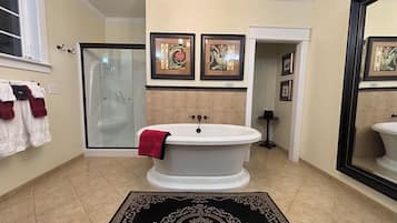 Suite, Garden View | Bathroom | Hair dryer, bathrobes, towels, soap