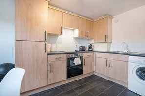 Fridge, microwave, oven, cookware/dishes/utensils