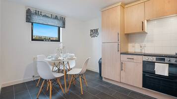 Fridge, microwave, oven, cookware/dishes/utensils