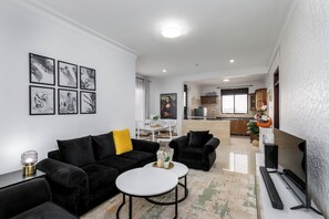 Living area - Elegant Apartment with Stunning Nature views. (Kampala)