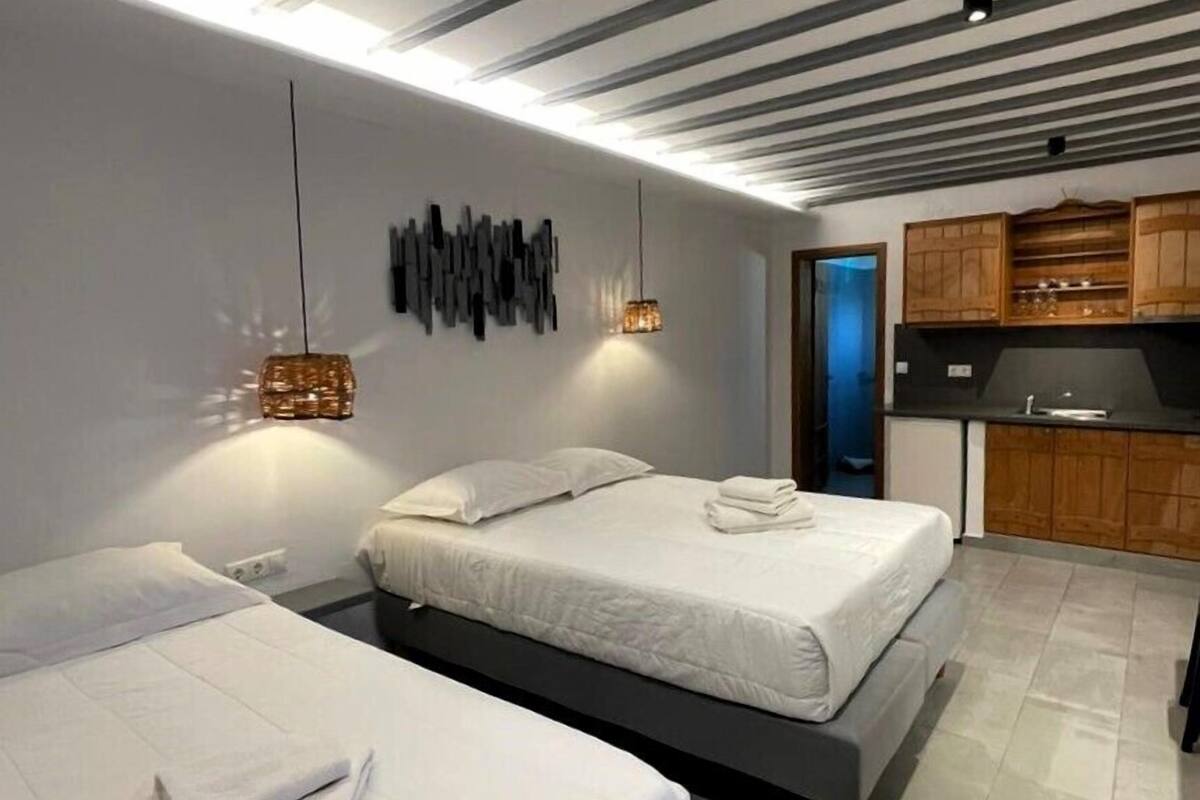 Standard Triple Room, Partial Sea View | Blackout drapes, soundproofing, iron/ironing board (on request)