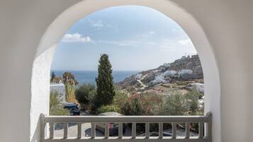 Standard Double Room, Balcony, Partial Sea View | Blackout drapes, soundproofing, iron/ironing board