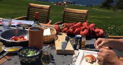 Lakefront home near Lawrencetown Beach with private sauna, hot tub and cold bath