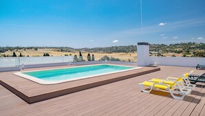 A rooftop pool with a clear view of the surrounding landscape. - Lagos Modern 1 With Pool by Homing (Lagos)