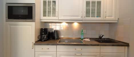 Fridge, oven, coffee/tea maker, toaster