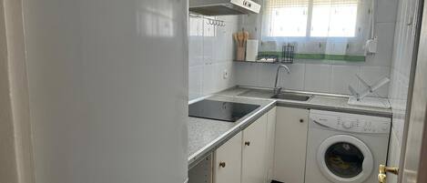 Fridge, coffee/tea maker, electric kettle, toaster