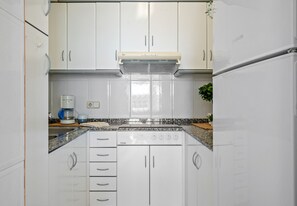 Fridge, microwave, coffee/tea maker, electric kettle