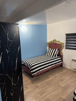 3 slaapkamers, een strijkplank/strijkijzer, wifi