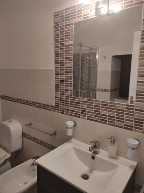 Hair dryer, towels, soap, toilet paper