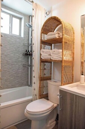 Hair dryer, towels, soap, toilet paper