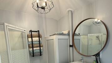 Hair dryer, towels, soap, shampoo