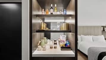 Hypoallergeen beddengoed, een minibar, een kluis op de kamer, een bureau