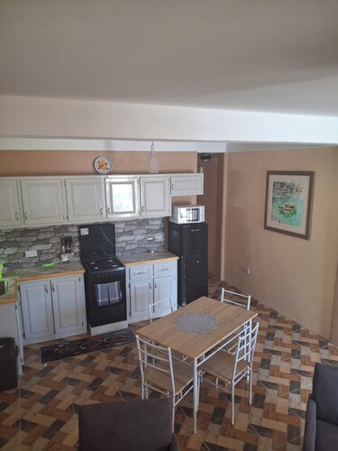 Spacious 2-bedroom apartment with AC, WiFi and parking in serene Pointe Michel