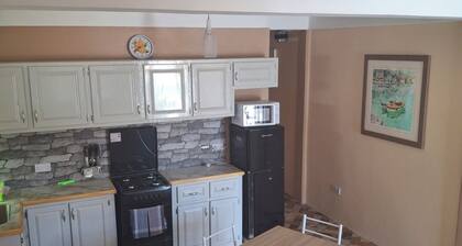 Spacious 2-bedroom apartment with AC, WiFi and parking in serene Pointe Michel