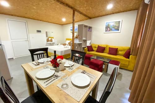 Habitació quàdruple, vistes al mar | Caixa forta a l'habitació i escriptori