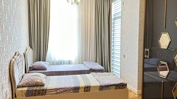 2 bedrooms, desk, iron/ironing board, travel cot