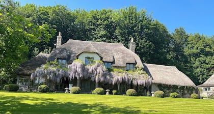 Country farmhouse surrounded by lakes green fields with private spa
